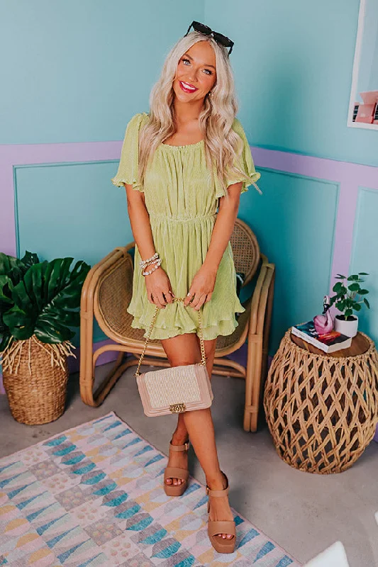 Flight Plans Pleated Dress In Lime Punch